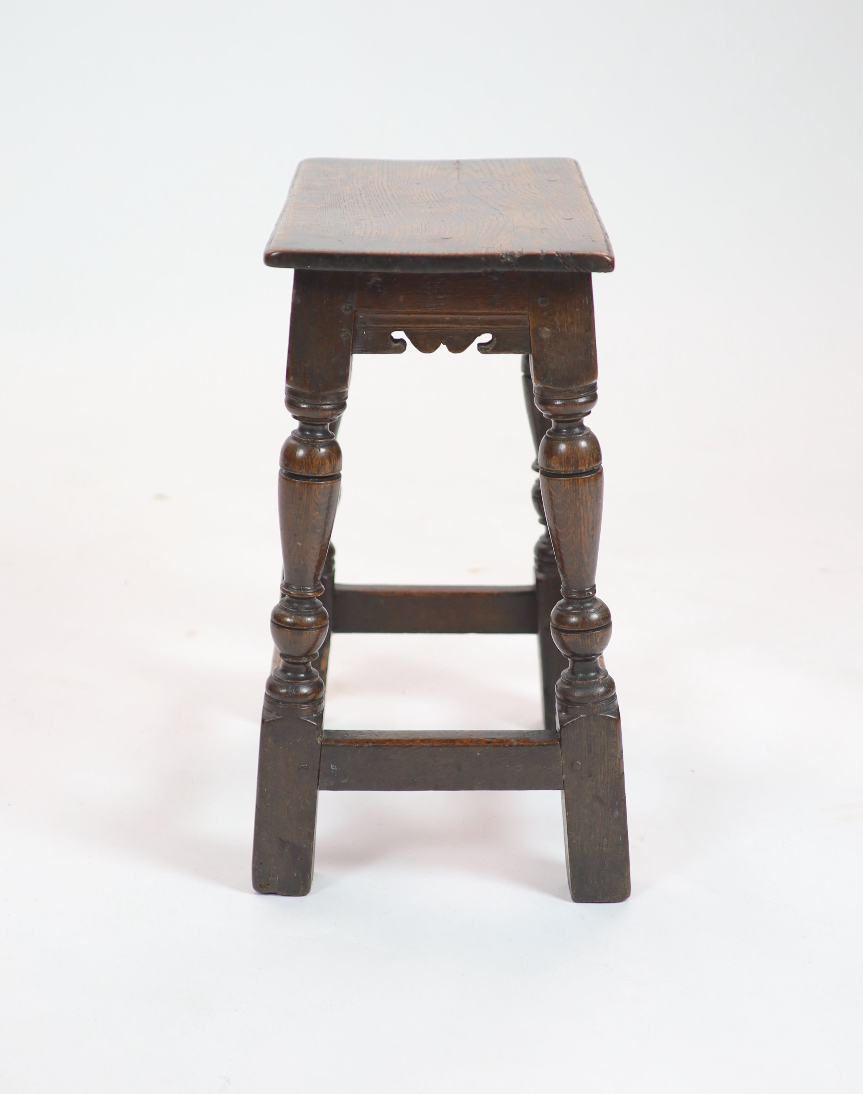 A Charles I oak joint stool, H 54cm. W 48cm. D 27cm.